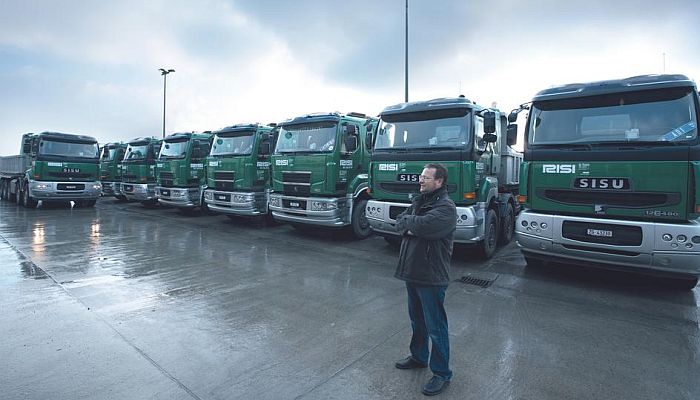 Line of trucks parked on the parking lot