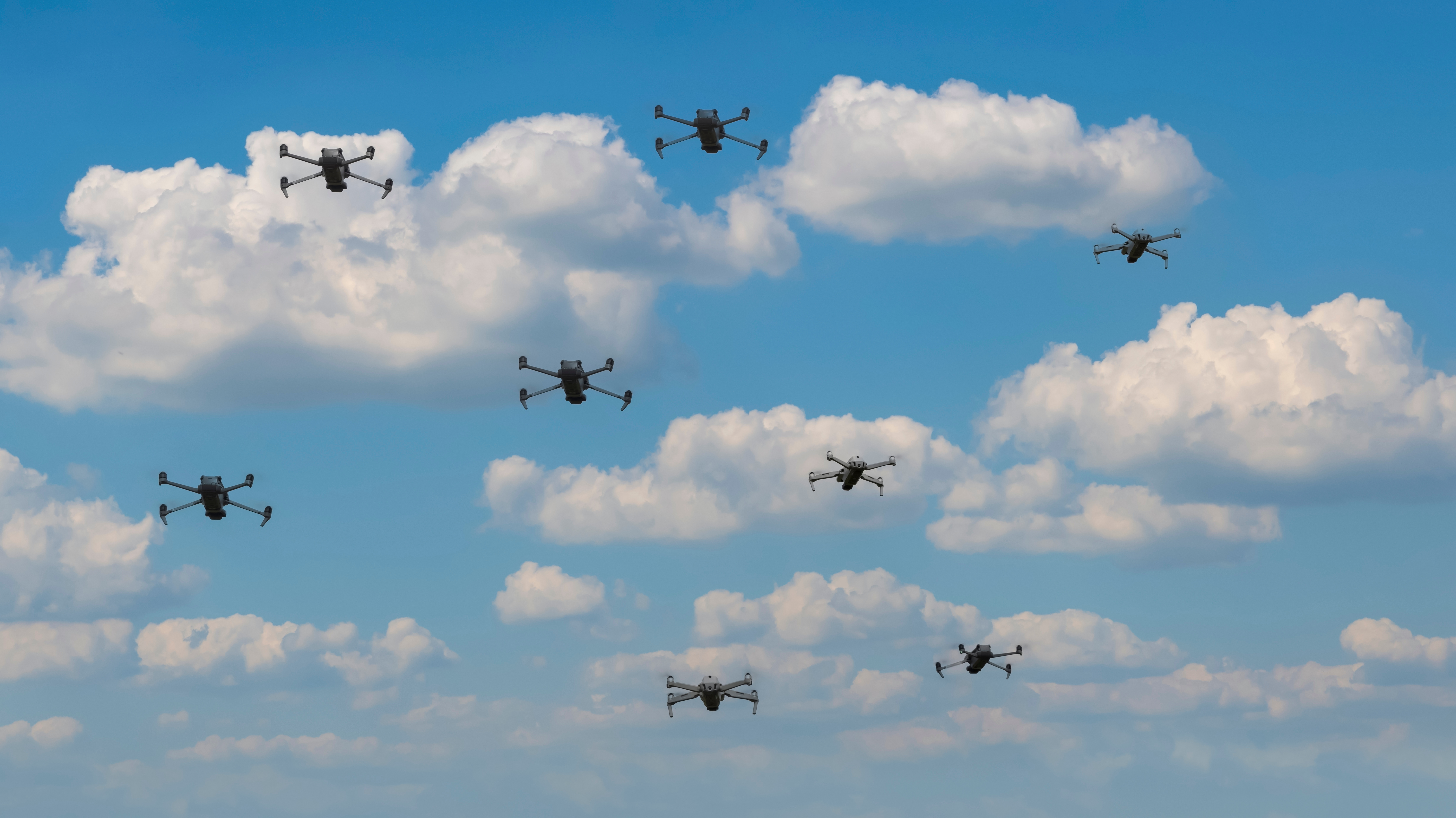 Multiple UAS drones flying in open sky requiring assured positioning navigation and timing