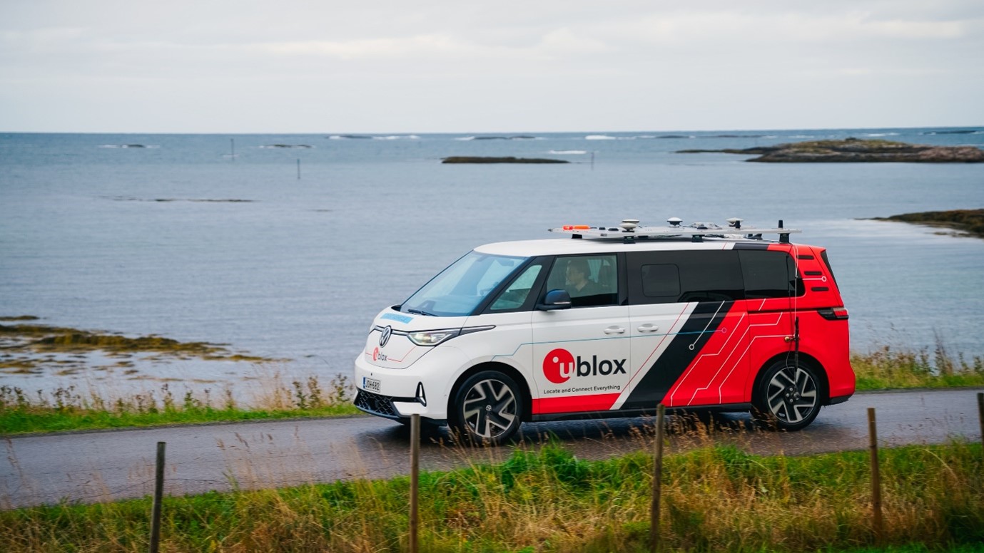u-blox GNSS test vehicle driving on a coastal road