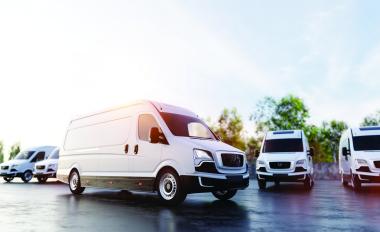 Fleet of delivery vans representing GNSS positioning for aftermarket telematics and fleet tracking applications