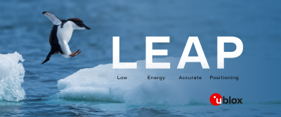 a penguin taking a big leap to the second ice floe