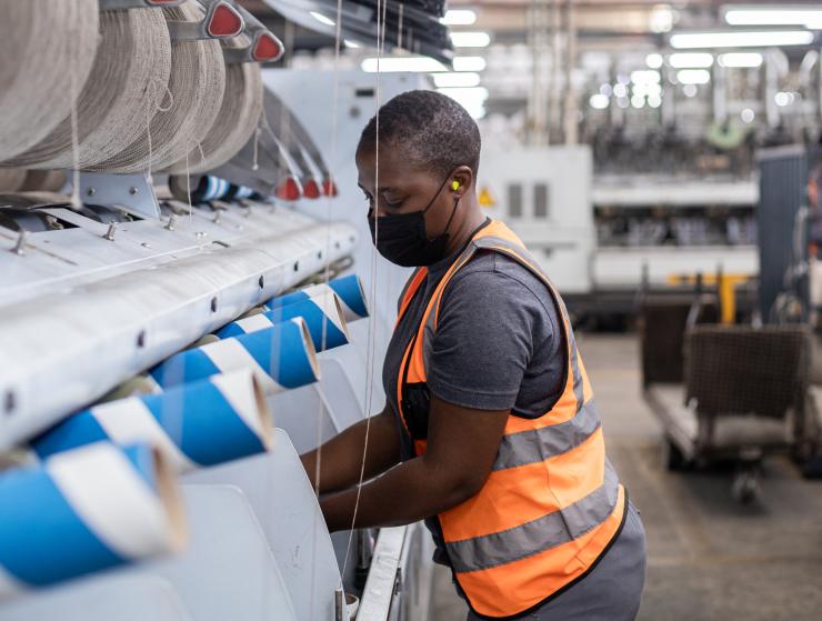 Image of worker in Belgotex factory