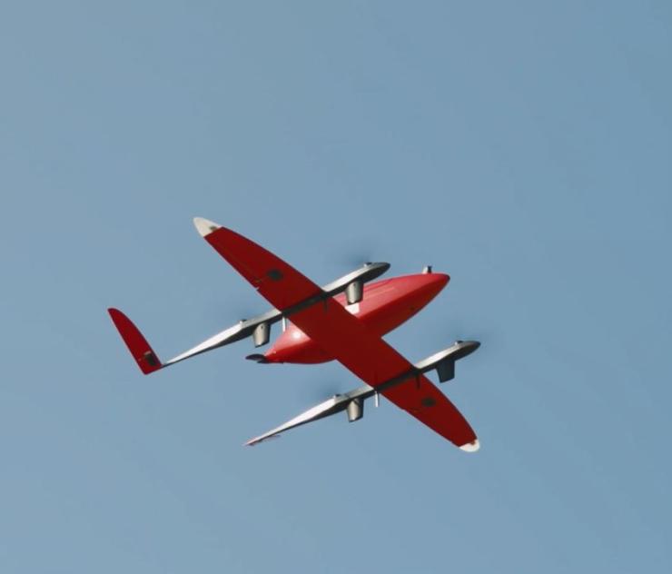 Red Rigitech long-range delivery drone Eiger in flight