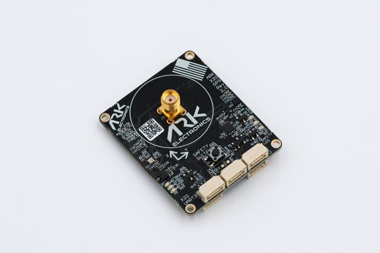 ARK X20 RTK GPS module (Rev 2.0) front view showing SMA antenna connector, safety switch, and JST-GH connectors, built on the u-blox ZED-X20P