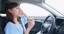 young woman enjoying a safe and comfortable drive