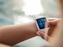 Health wearable displaying data on wrist